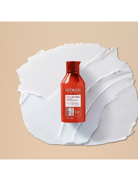 Redken Frizz Dismiss Conditioner Кондиціонер для контролю небажаних завитків та дисципліни волосся