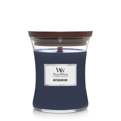 WoodWick Antiquarium Medium Ароматическая свеча с ароматом белого кардамона и табачных листьев Средняя
