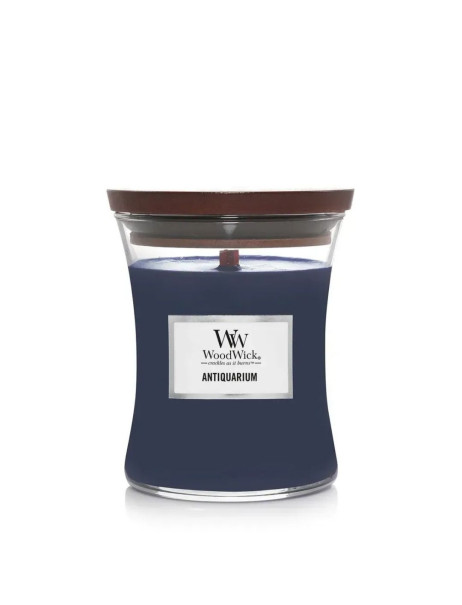 WoodWick Antiquarium Medium Ароматическая свеча с ароматом белого кардамона и табачных листьев Средняя